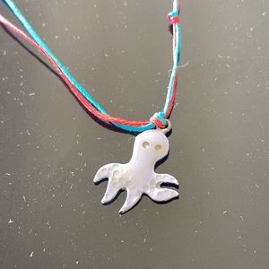 Octopus 🐙 red & blue rope necklace w/ ❤️ and 🌸 as a finish touch.